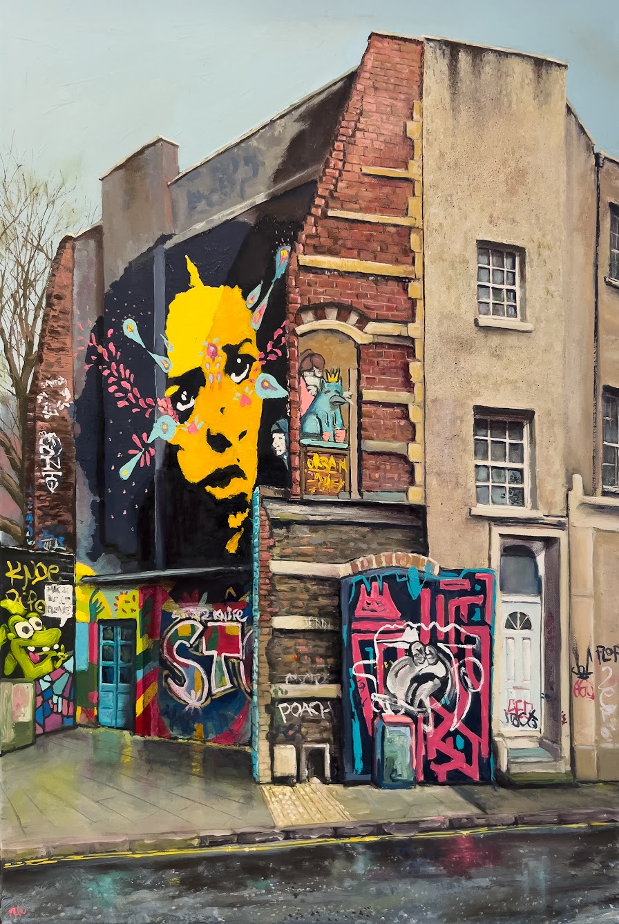Art hung in a lived-in city room